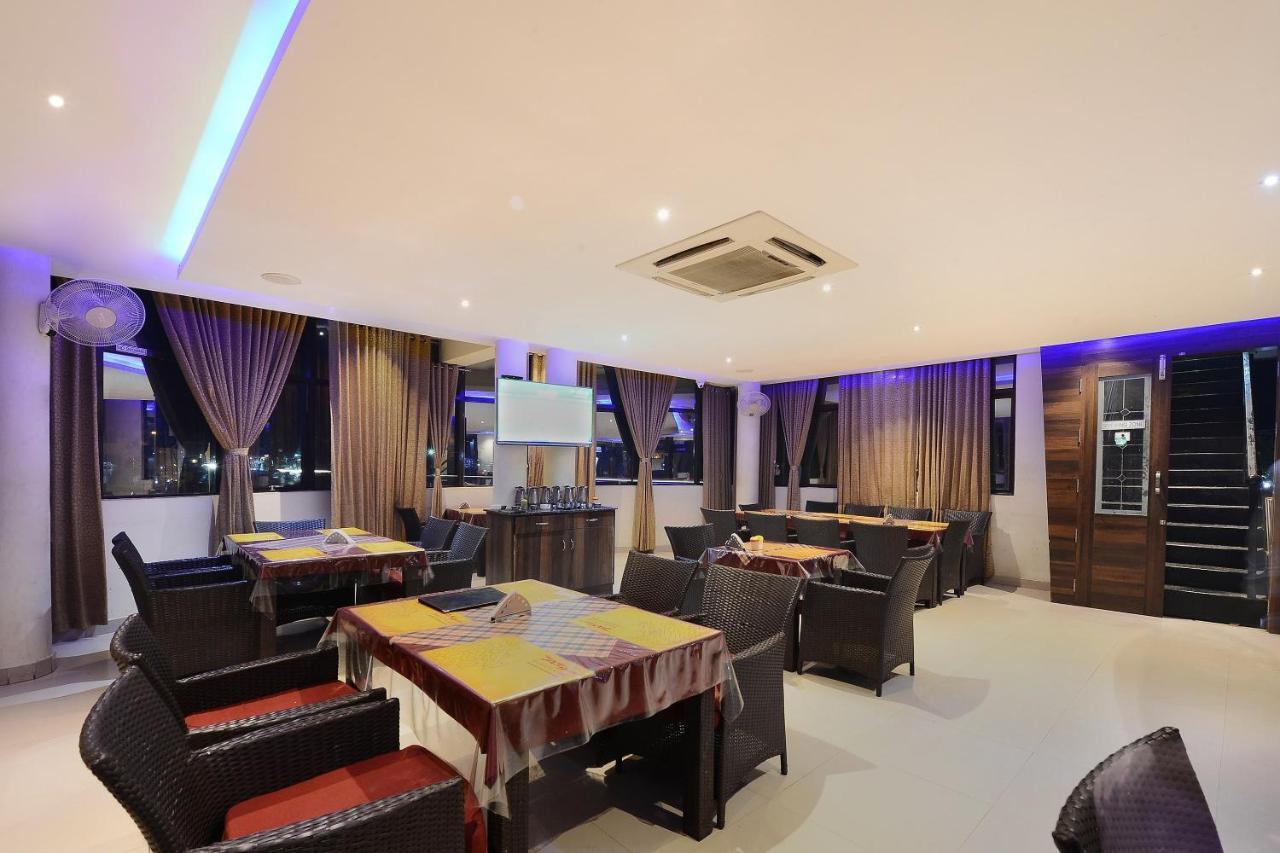 Capital O Hotel Samanvi International Belur  Exterior photo